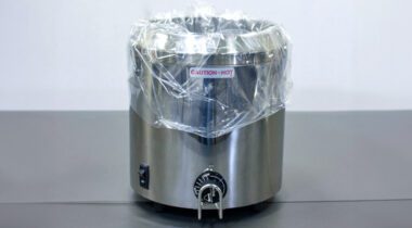 empty round crock pot with plastic liner